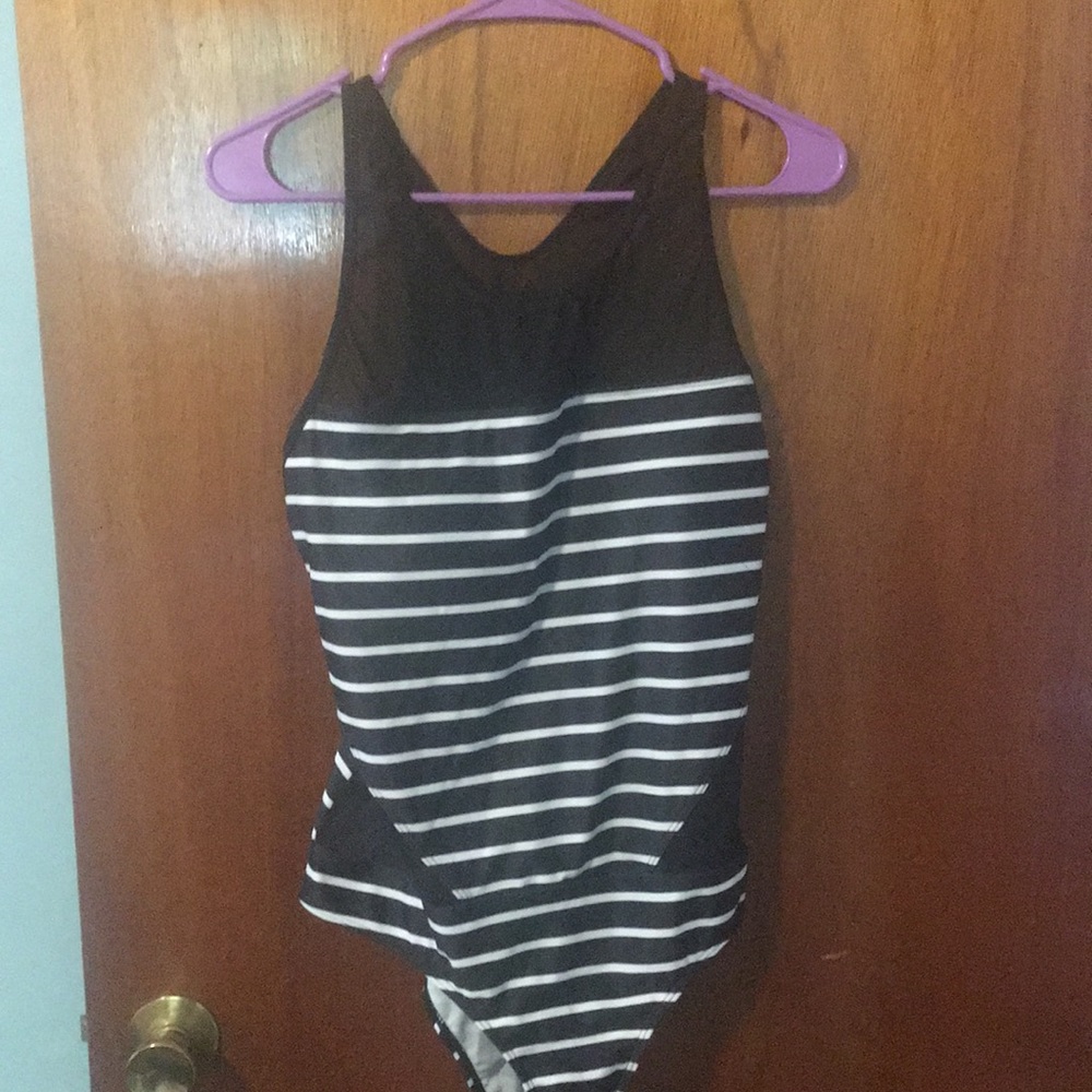 One piece swim. New without tags. Hygienic liner.